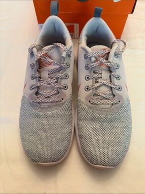 Nike Women’s Athletic Shoes Light Blue with Peach Swoosh